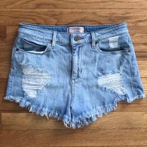 High waisted Guess ripped shorts